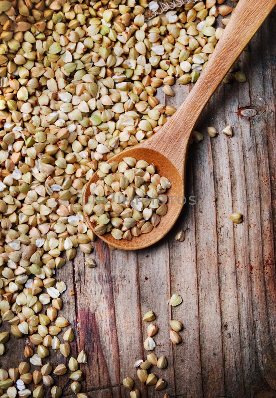 Buckwheat in wooden spoon