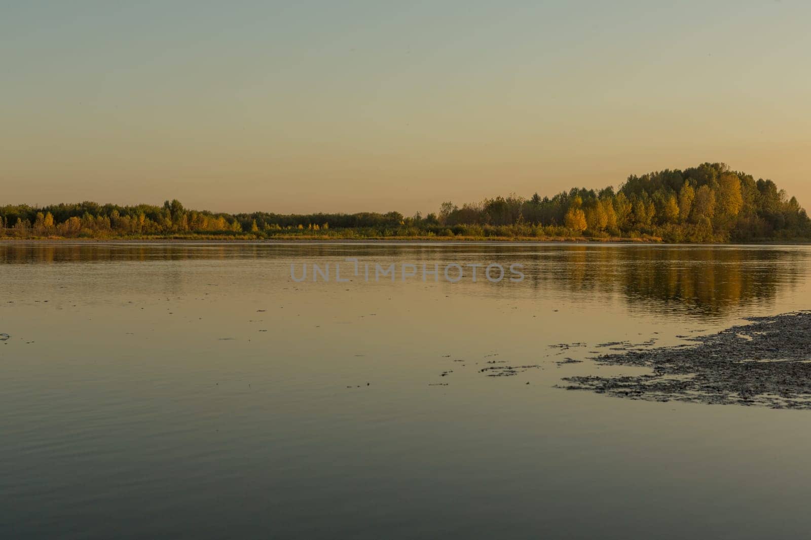 Summer sunset on the river , sunset by the water.