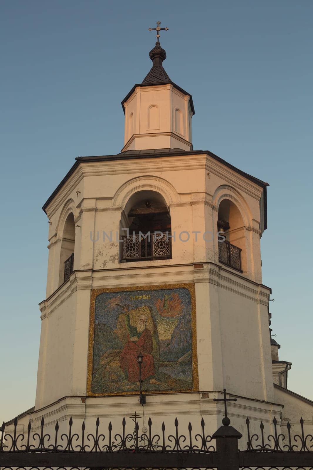 Snow-white ancient temple of Elijah the Prophet from the village of Ilyinka, Novokuznetsk district.