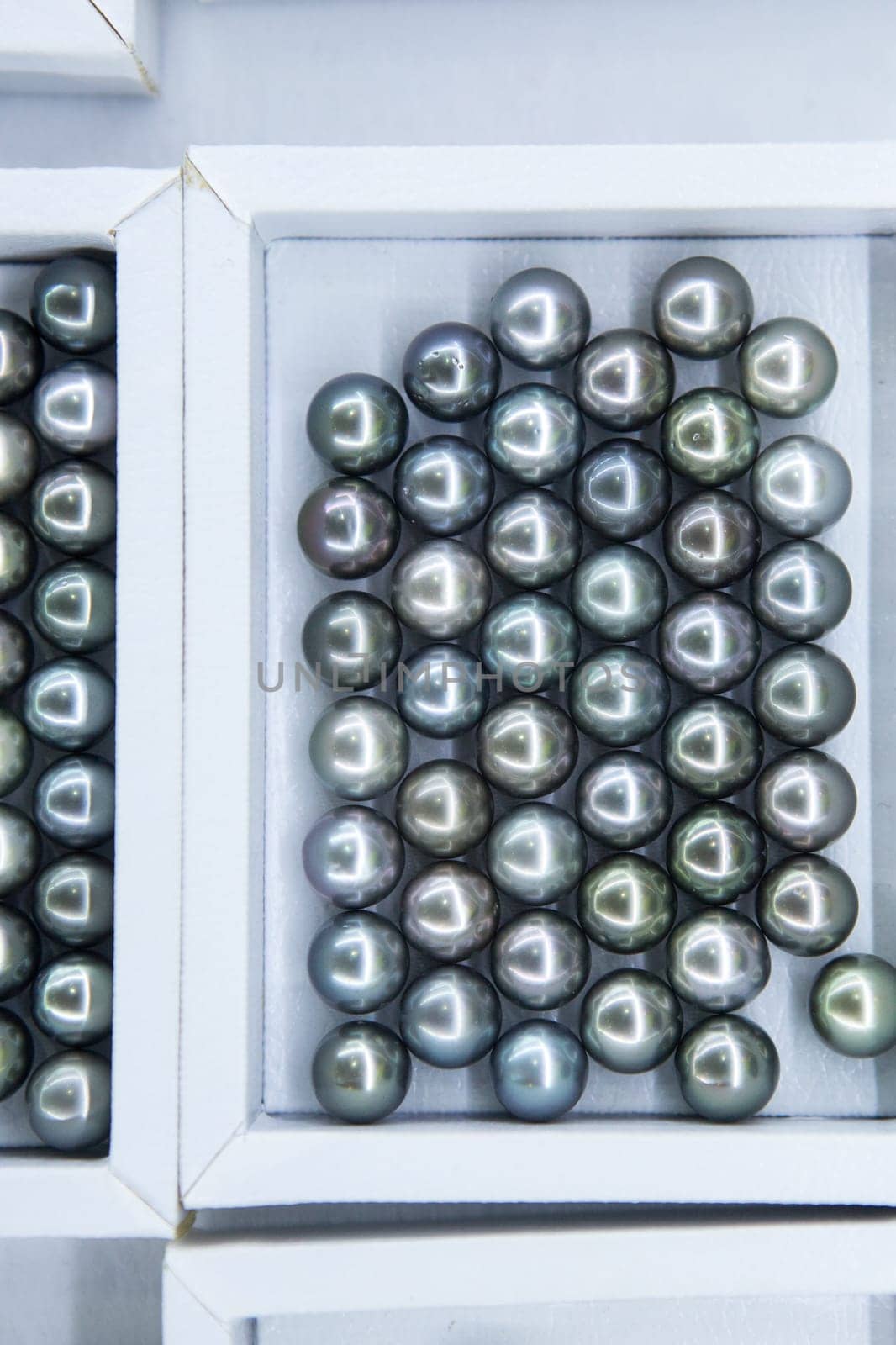 Artificial jewelry stones in the jewelry store window.