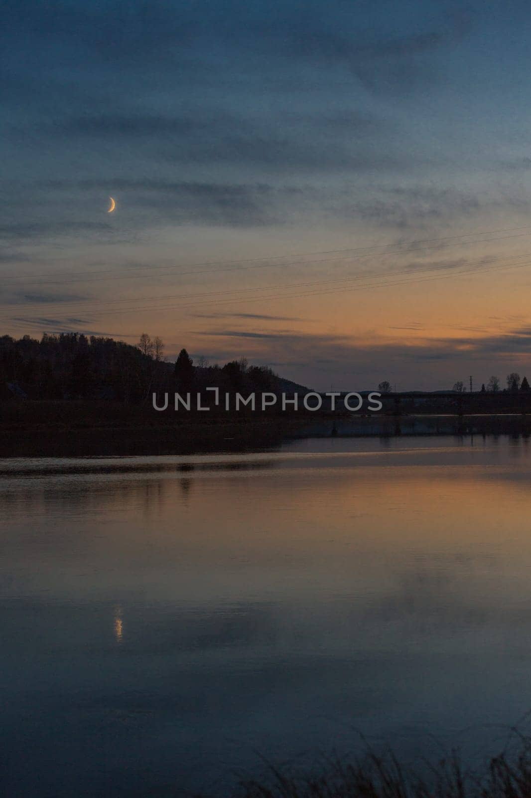 Summer sunset on the river , sunset by the water.