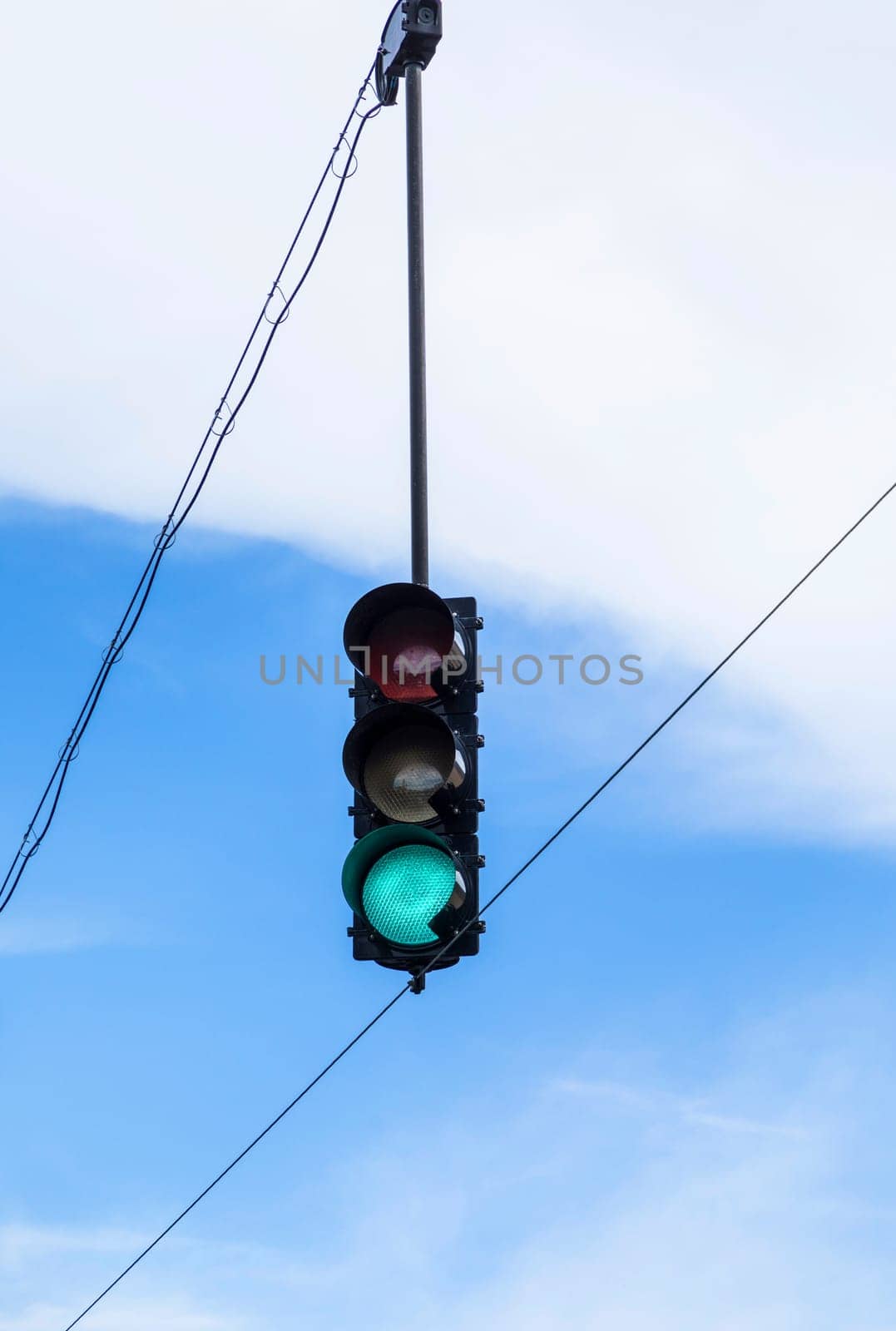 overhead traffic light under blue sky
