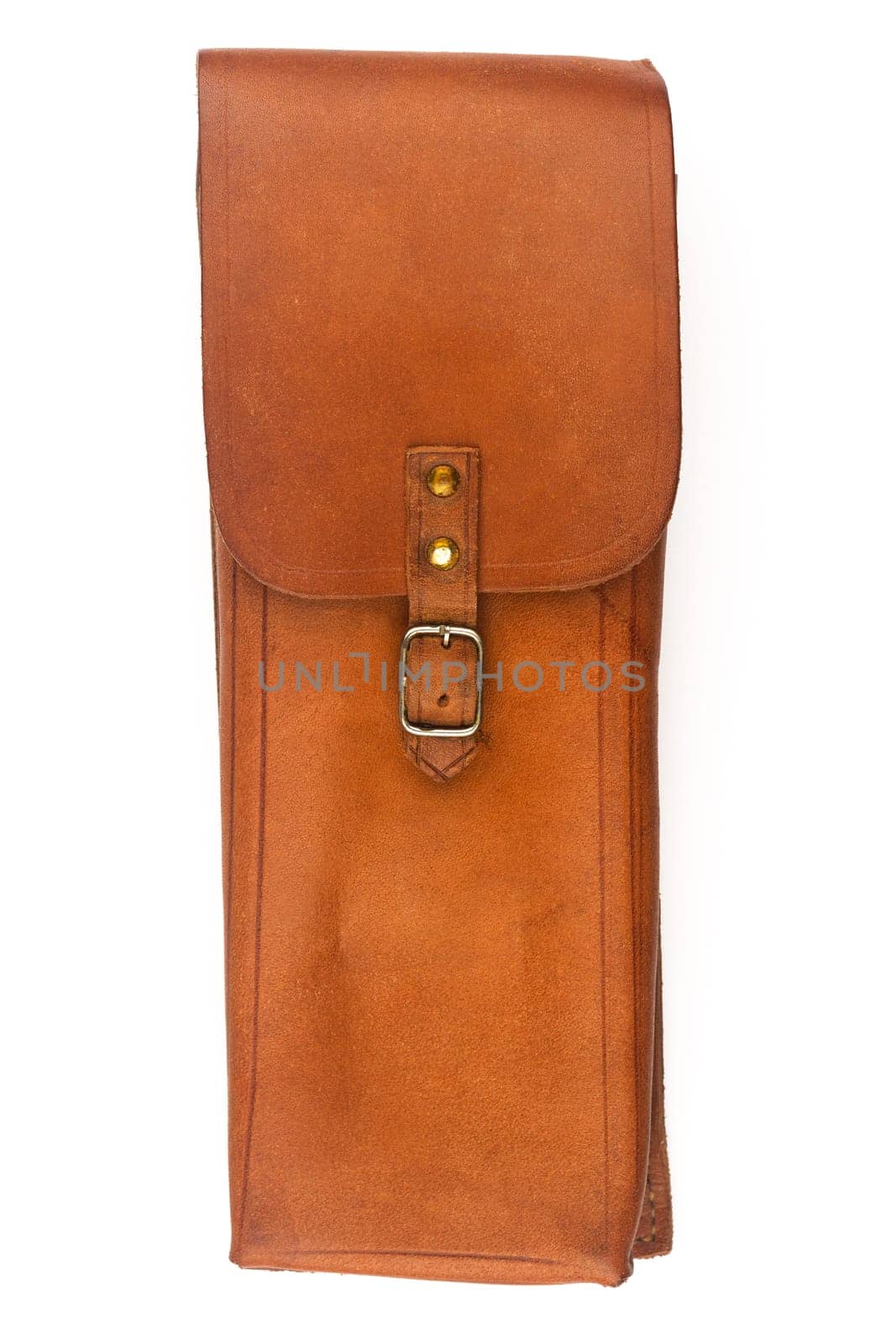 front view closeup of closed handmade vintage brown leather satchel pouch with rough weathered texture and metallic buckle isolated on white background