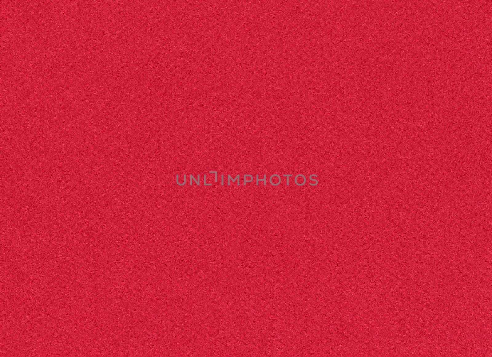 front view macro closeup of empty flat red colored paper texture with visible surface pulp fiber details