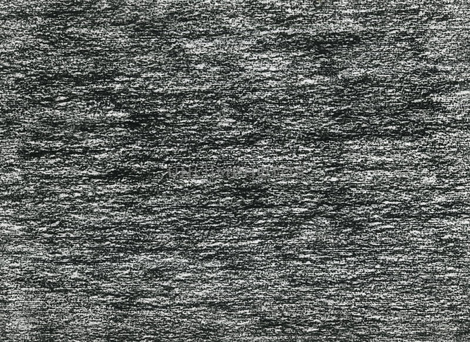 closeup of heavy black pencil horizontal doodles brushes on white background