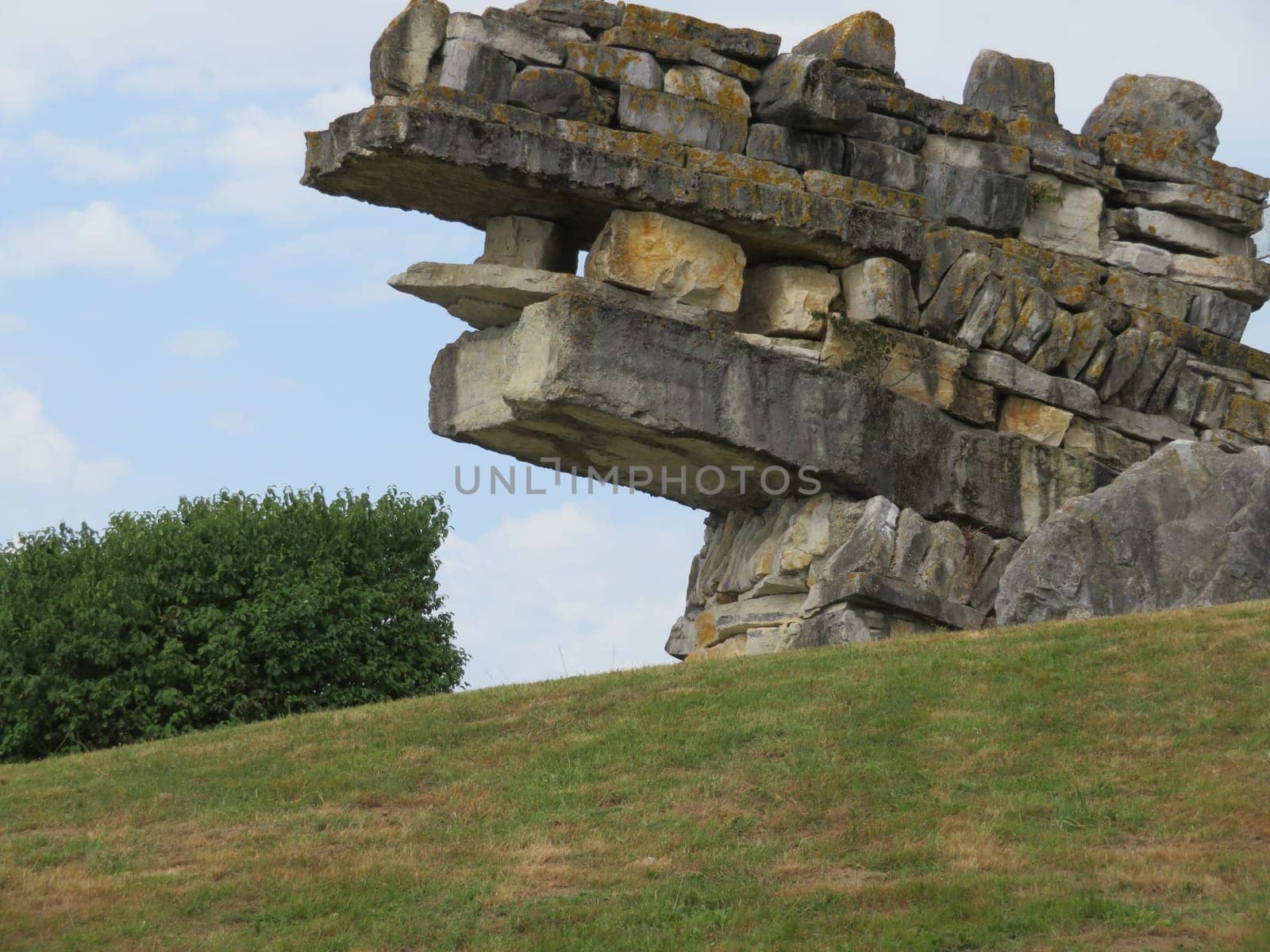 beautiful dragon-shaped stone wall coming out of the earth