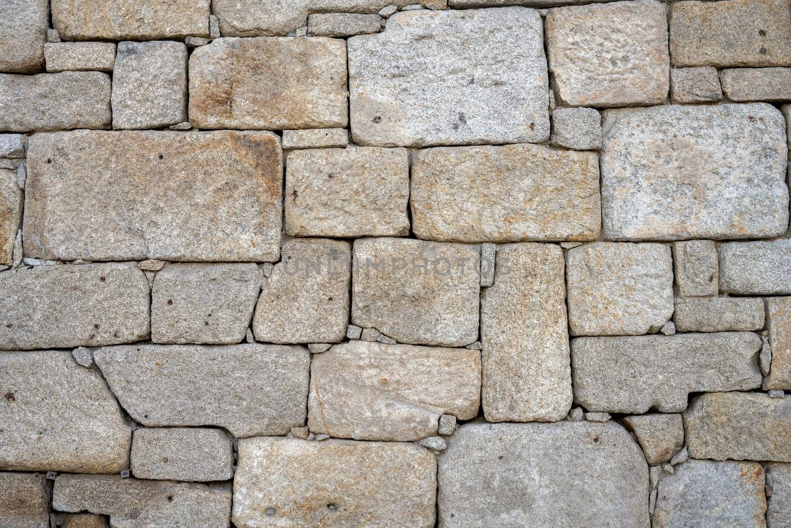 Natural background from an old stone wall