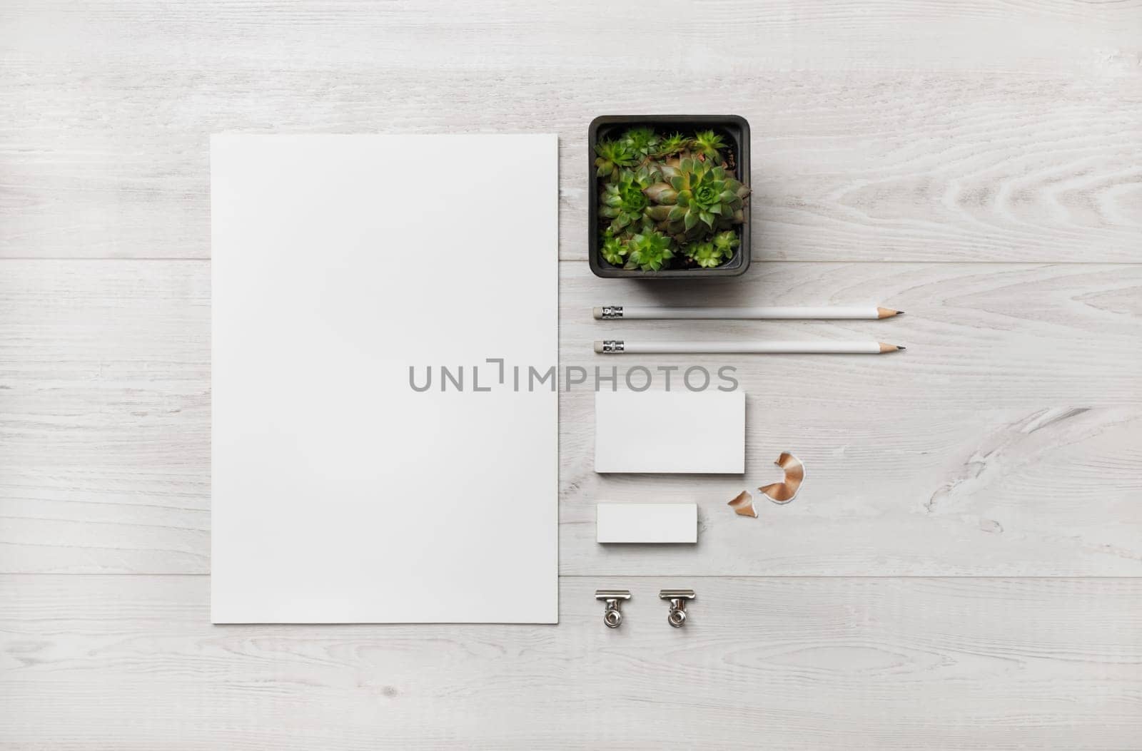 Blank branding identity set on wooden background. Corporate stationery template. For design presentations and portfolios. Flat lay.