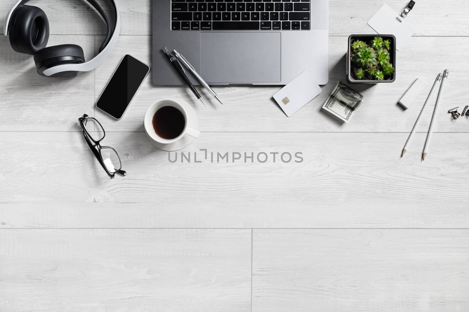 Workspace with office supplies and gadgets. Copy space for your text. Flat lay.