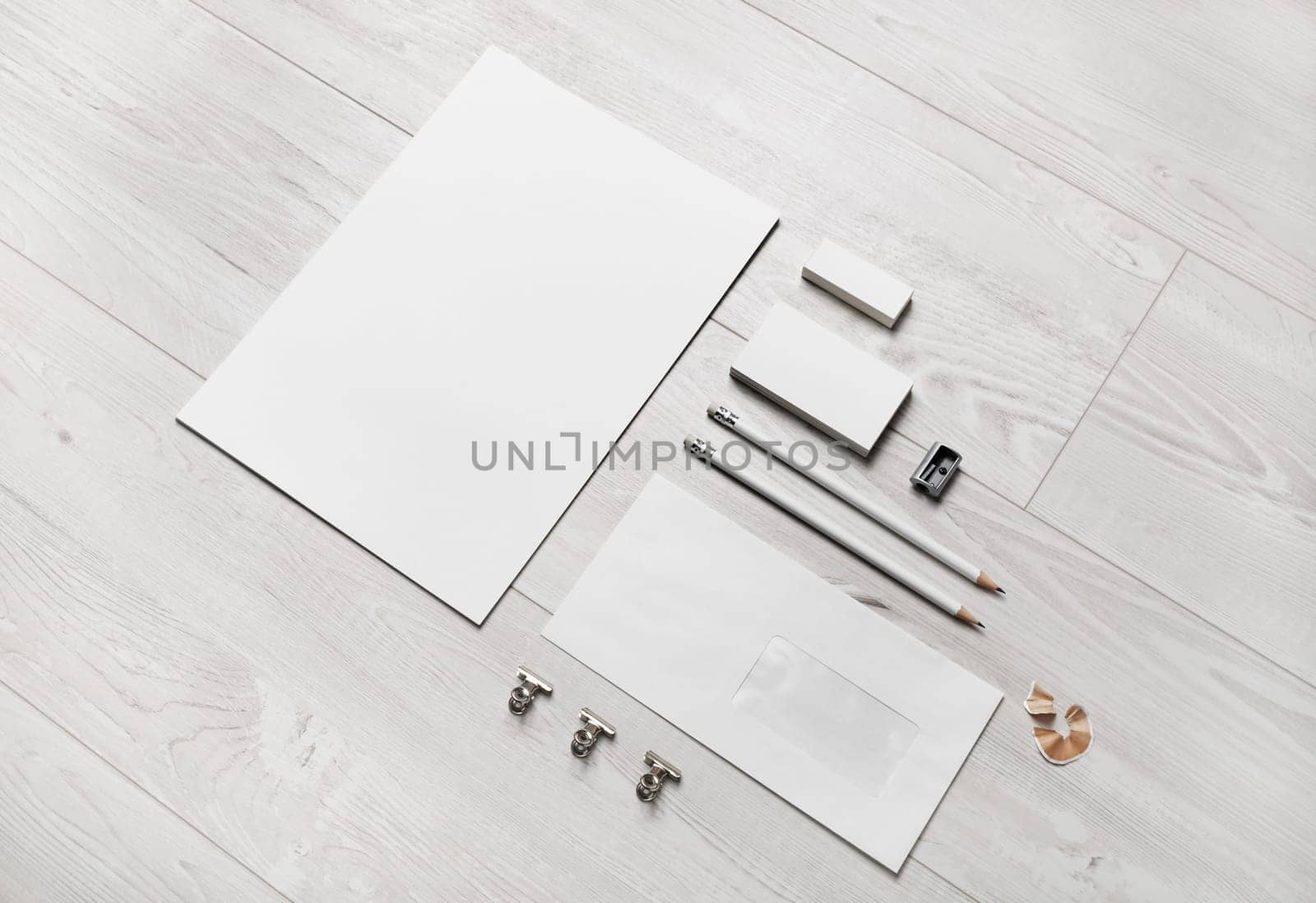 Blank stationery set and corporate identity template on wooden background. For design presentations and portfolios.
