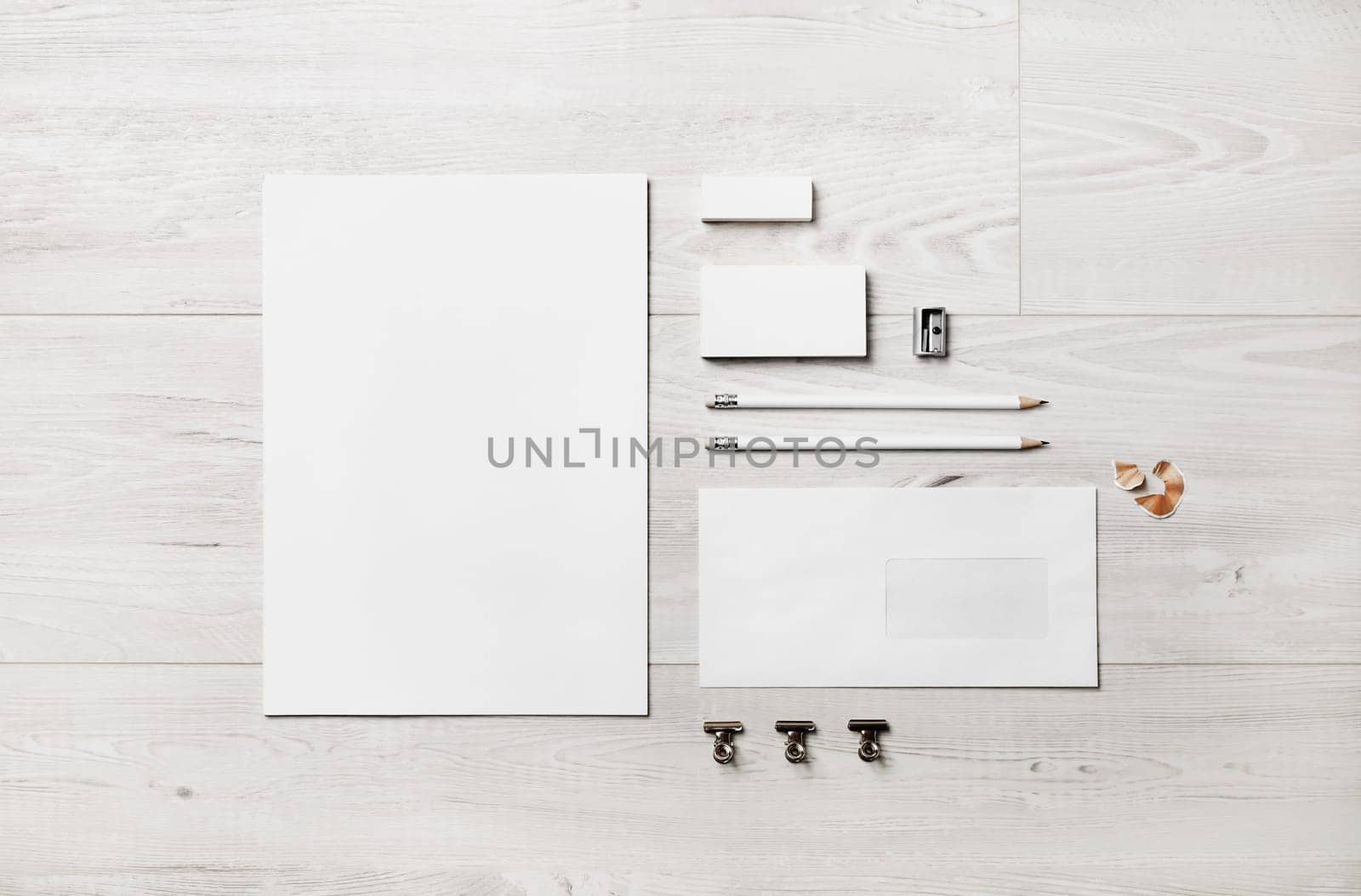 Blank corporate stationery set on wood background. Template for branding identity. Flat lay.
