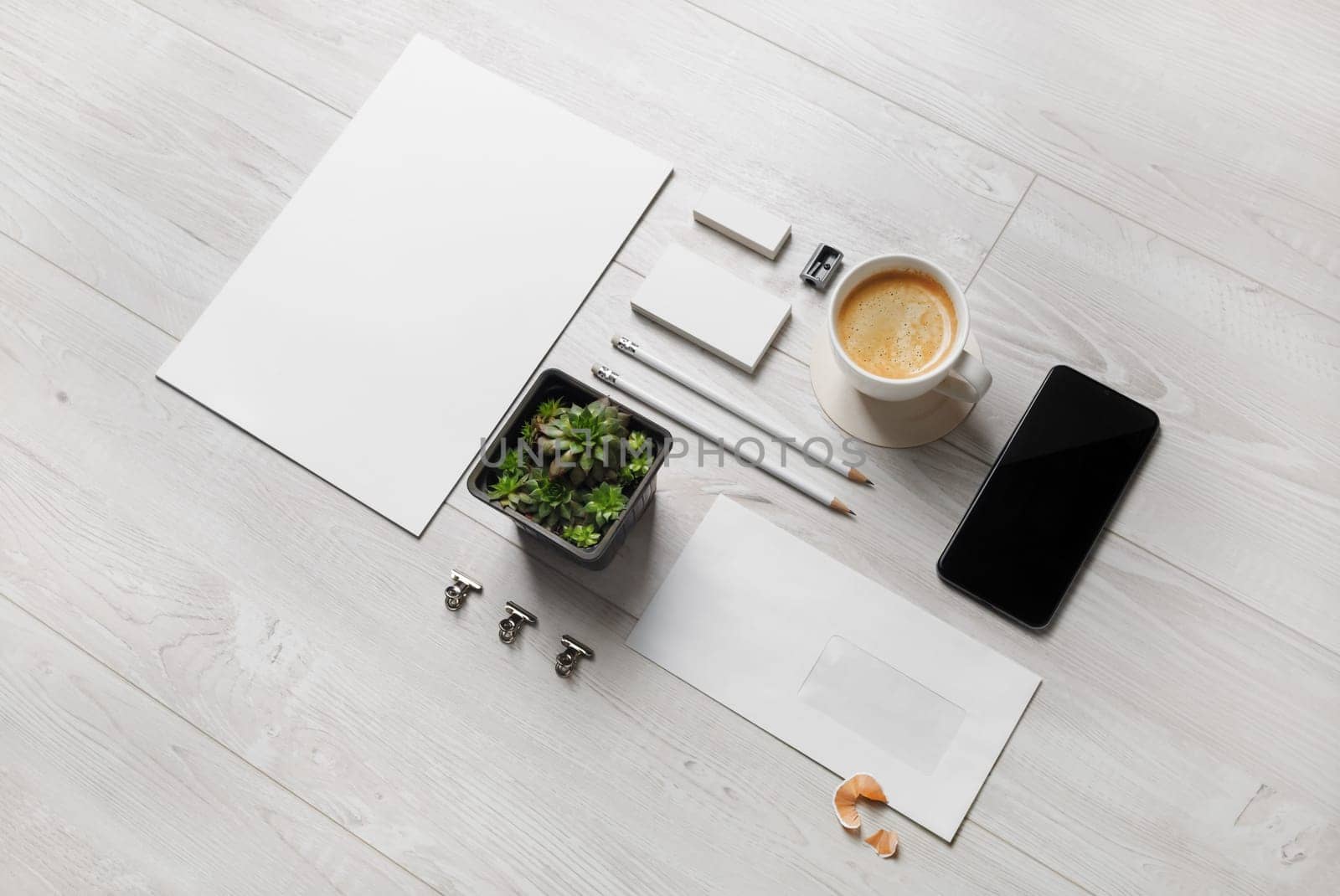 Photo of blank stationery set on wood background. Corporate identity template. Responsive design mockup.