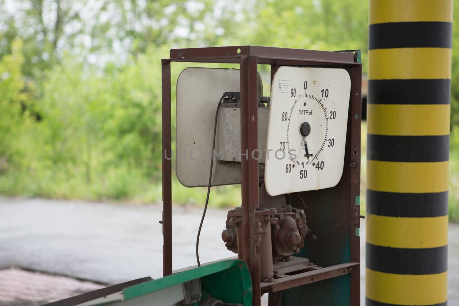 an old abandoned gas station far from the road.