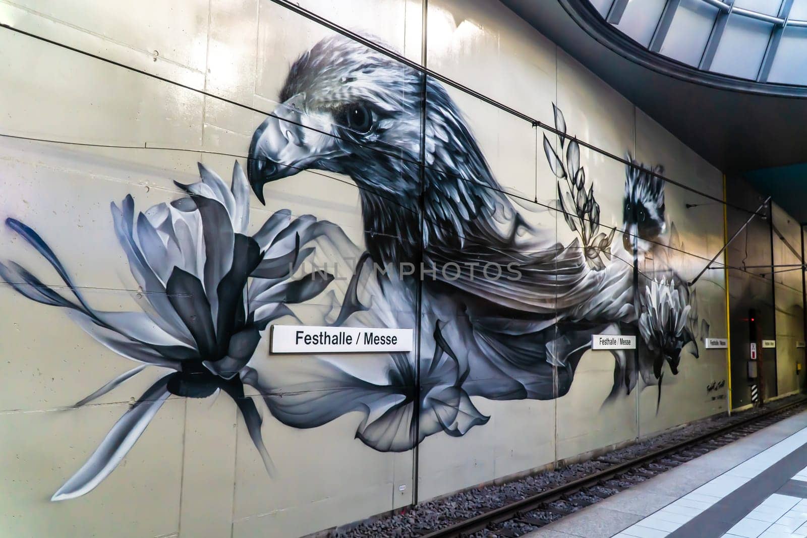 Frankfurt, GERMANY - October 09, 2021: Streetart from Artist Alexander Bacon in Subway Station Festhalle - Messe, Frankfurt Main, Germany