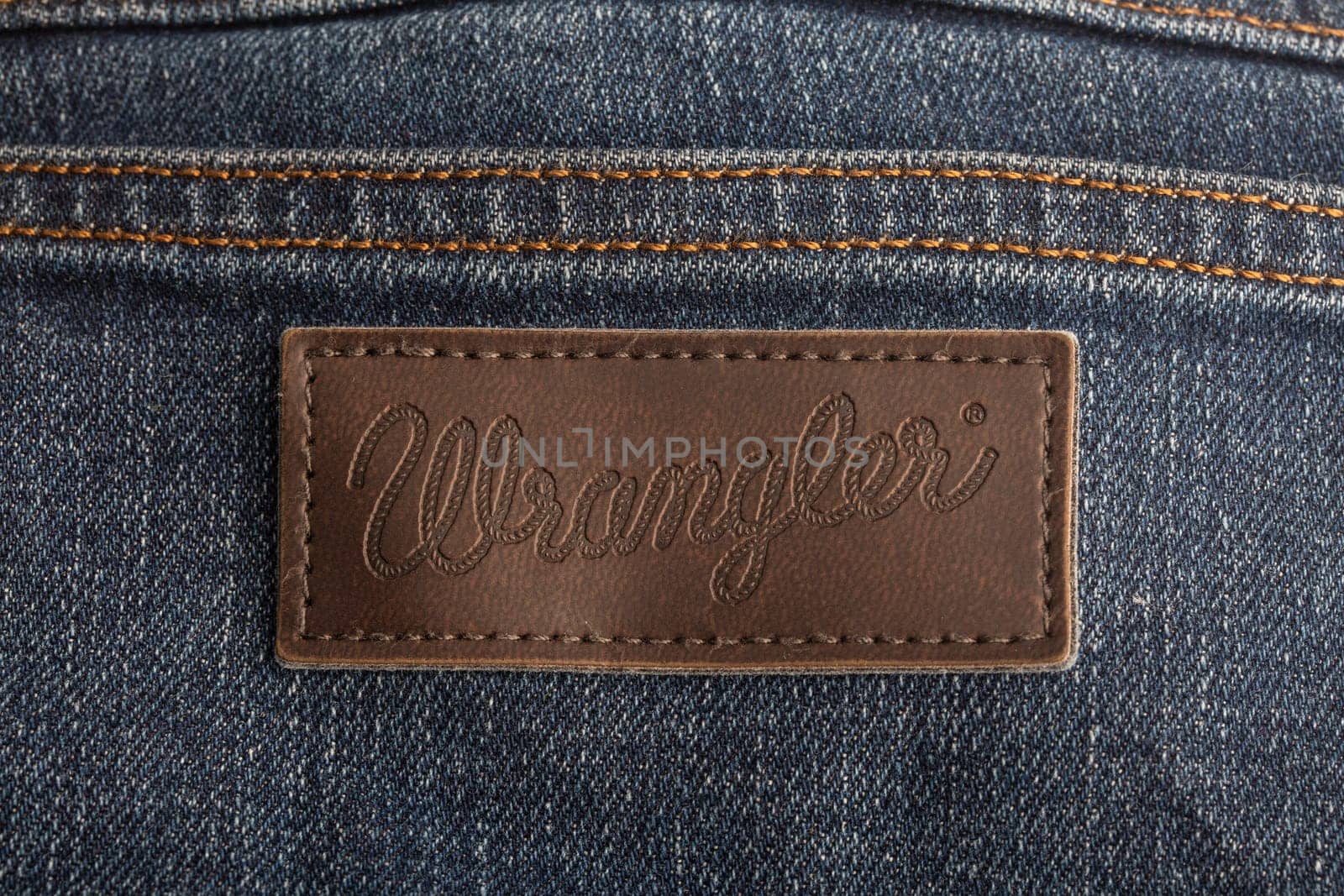 Huettenberg, Germany - 2021-10- Wrangler Jeans label close up , product shot.