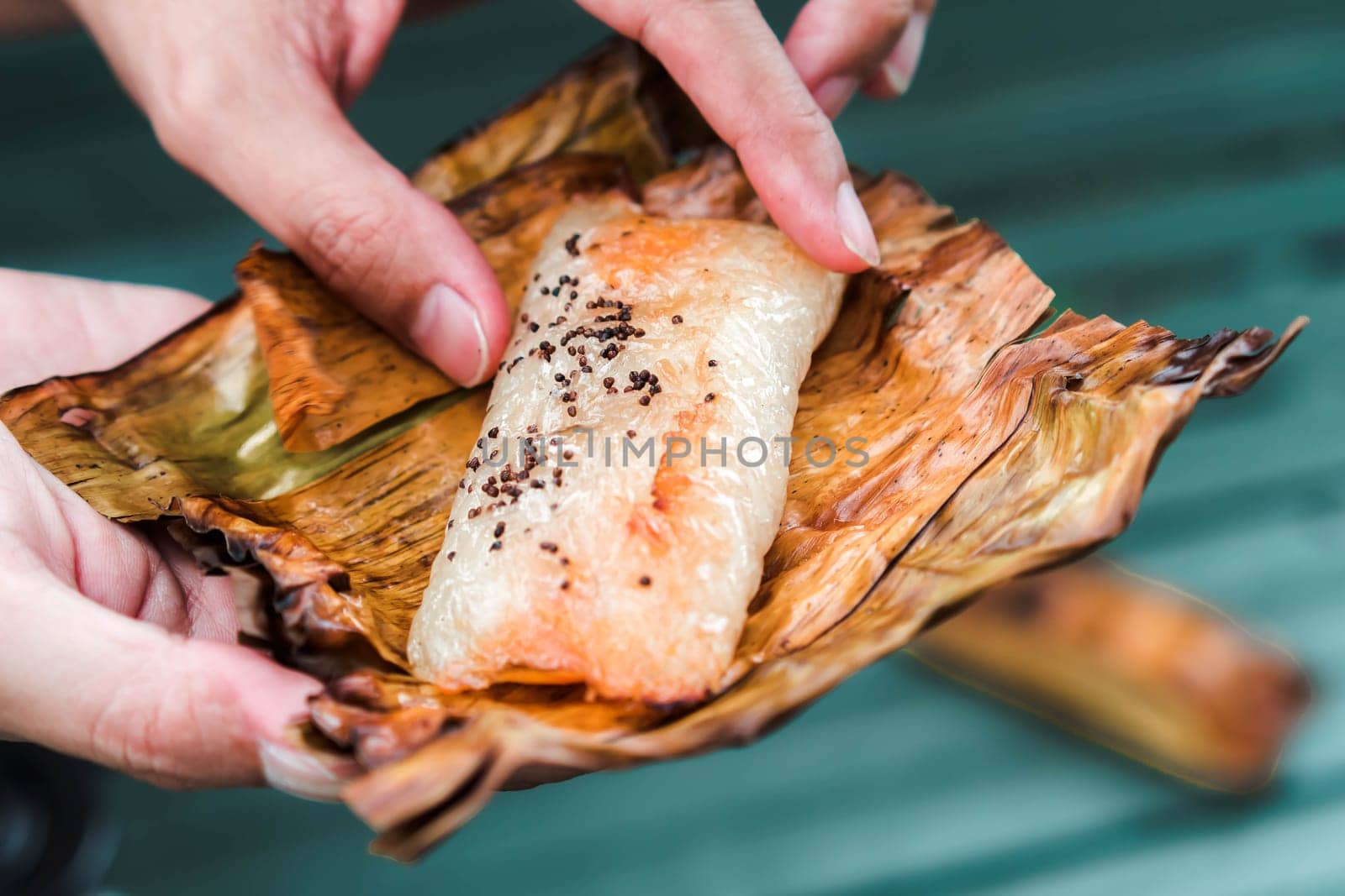 Thai traditional dessert. Grilled Taro Stuffed Coconut Sticky Rice