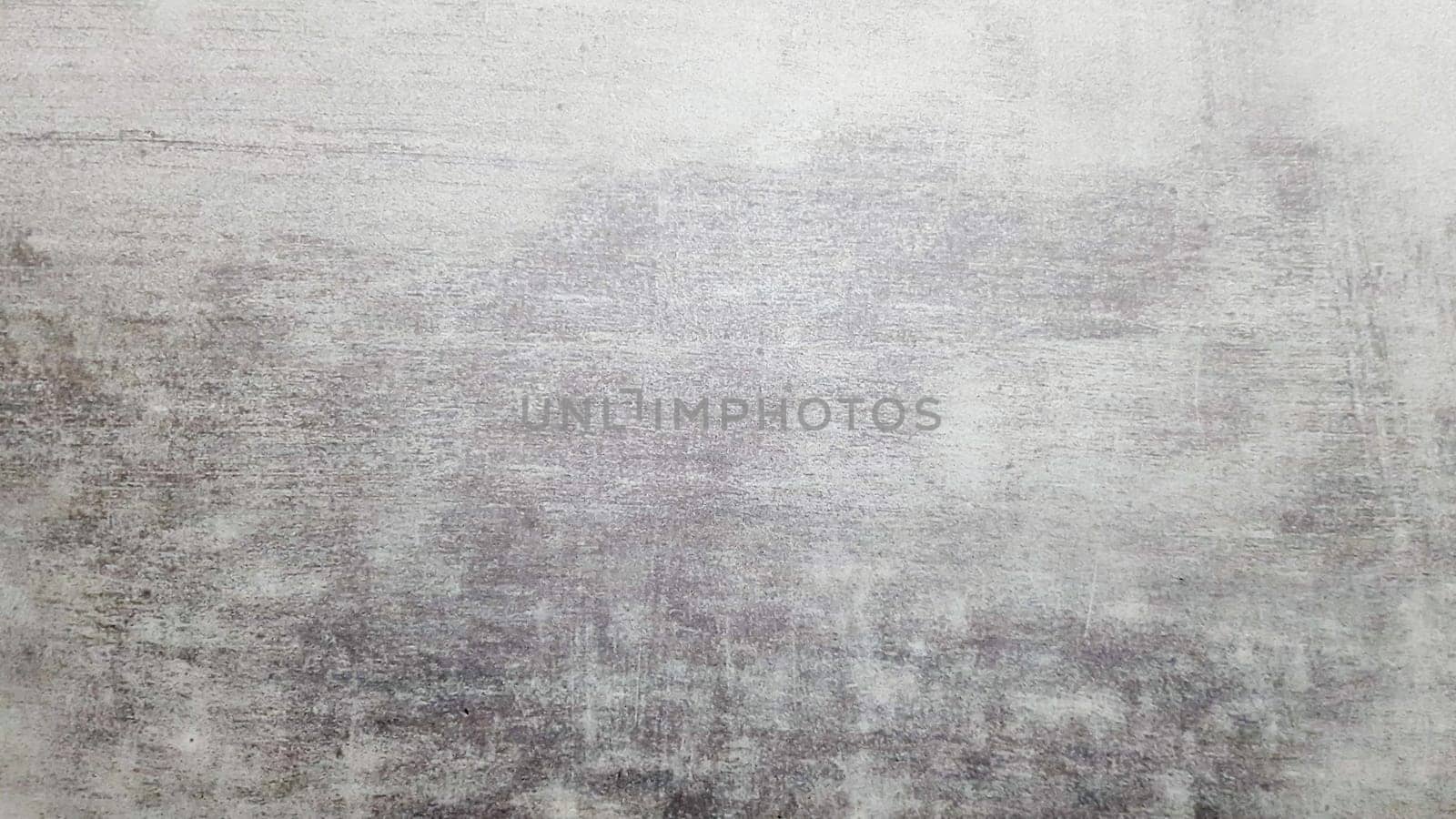Natural gray slate stone background pattern. View from above. Copy space. Tile with a gray tint. Texture and seamless background.