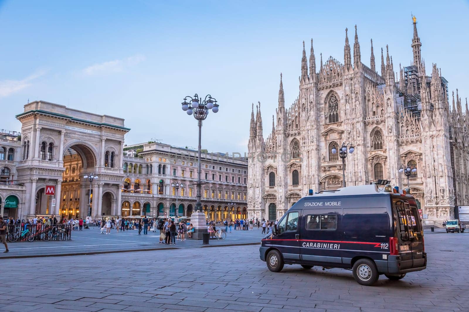 MILAN, ITALY - CIRCA SEPTEMBER 2019: Carabineer car, also named Carabinieri,  patrolling Milan City area in front of Mialn Cathedral. Surveillance and crime prevention.