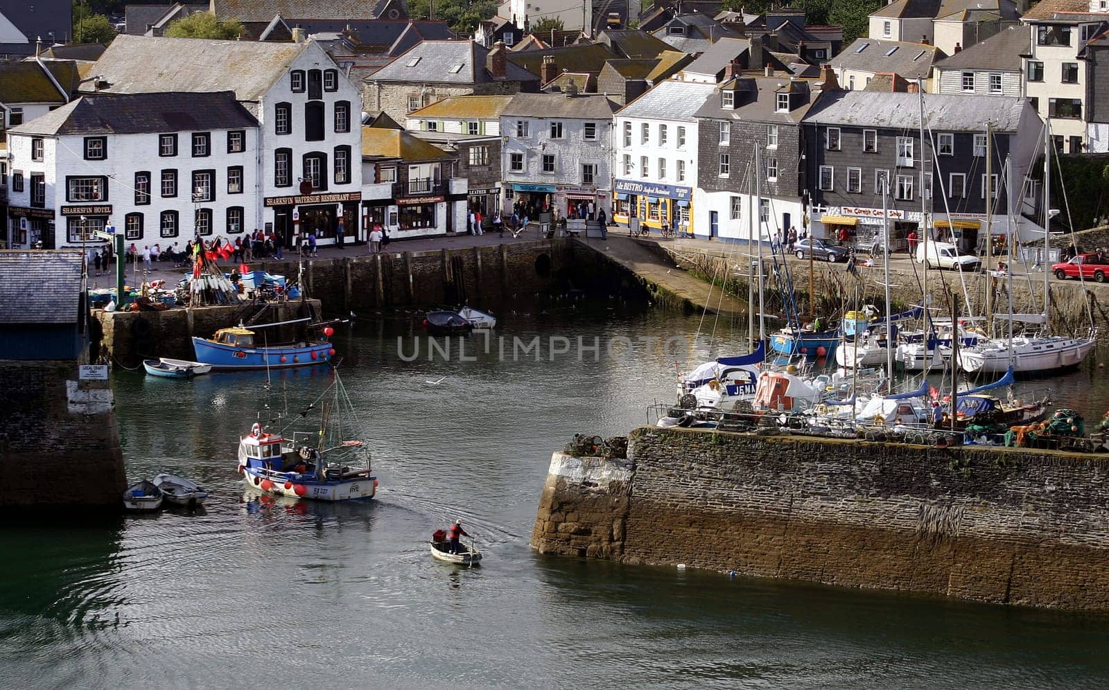 The town of Mevagissey Cornwall England with mackerel fishing boats in the harbour