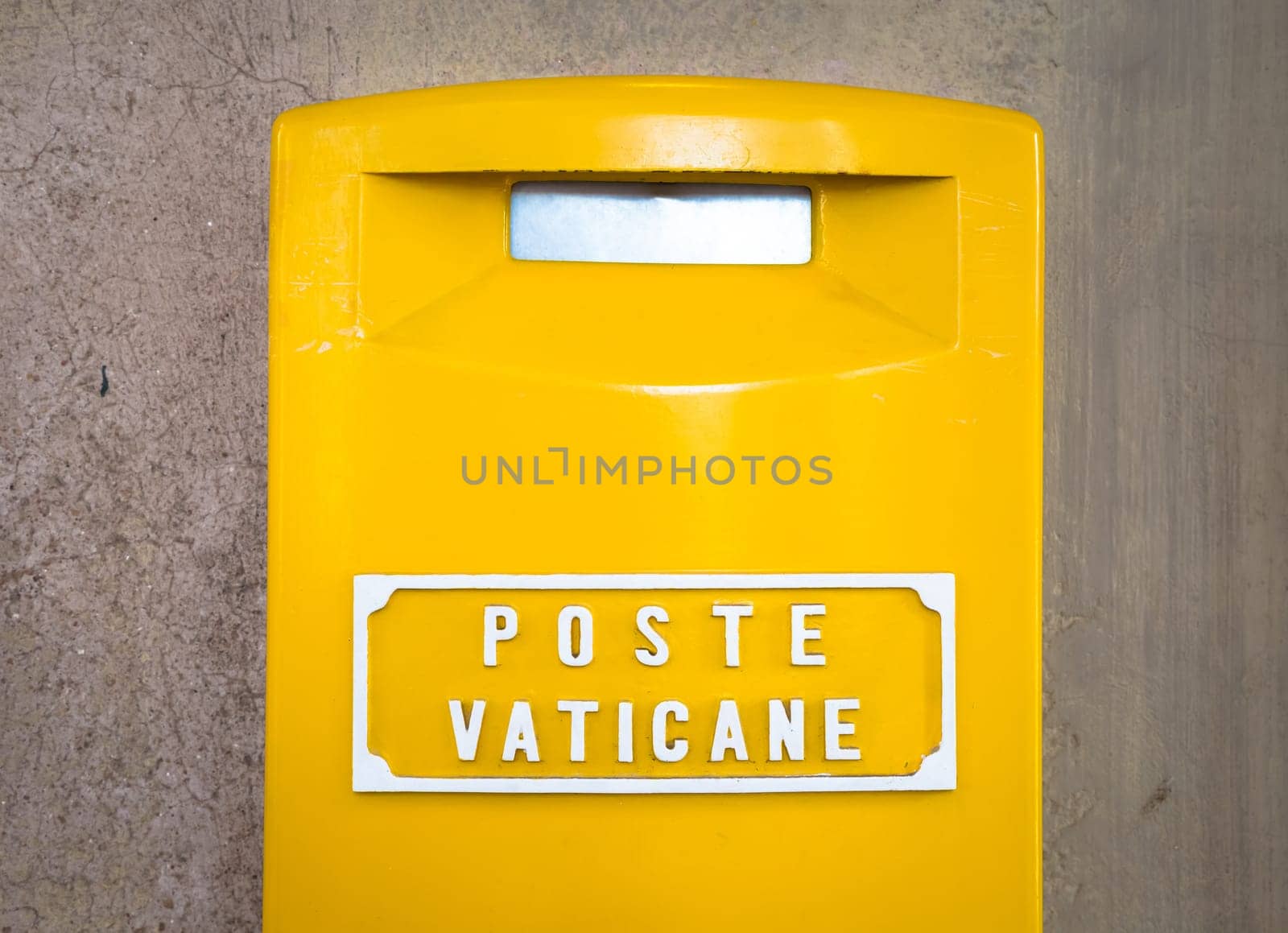 ROME, VATICAN STATE - AUGUST 19, 2018: Detail of the traditional yellow post box in Vatican City, Rome