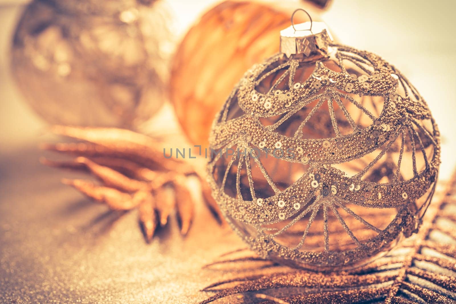 Christmas ornaments in golden tones