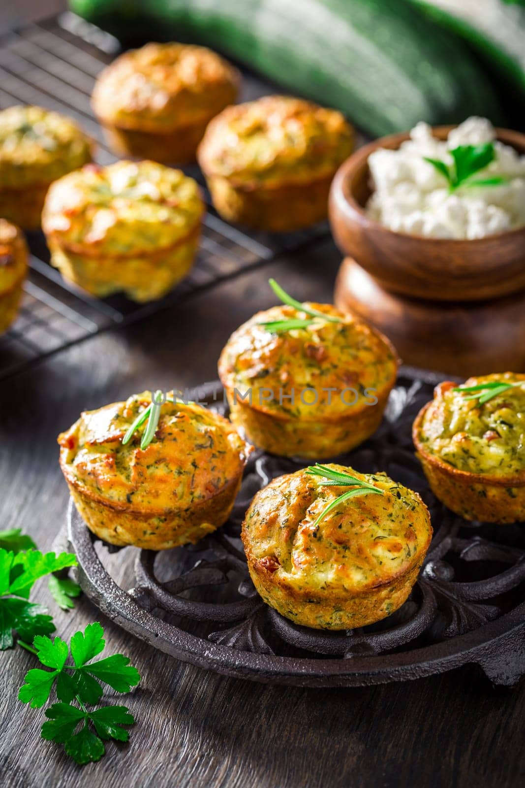 Homemade zucchini muffins with feta cheese, savory courgette with ingredients