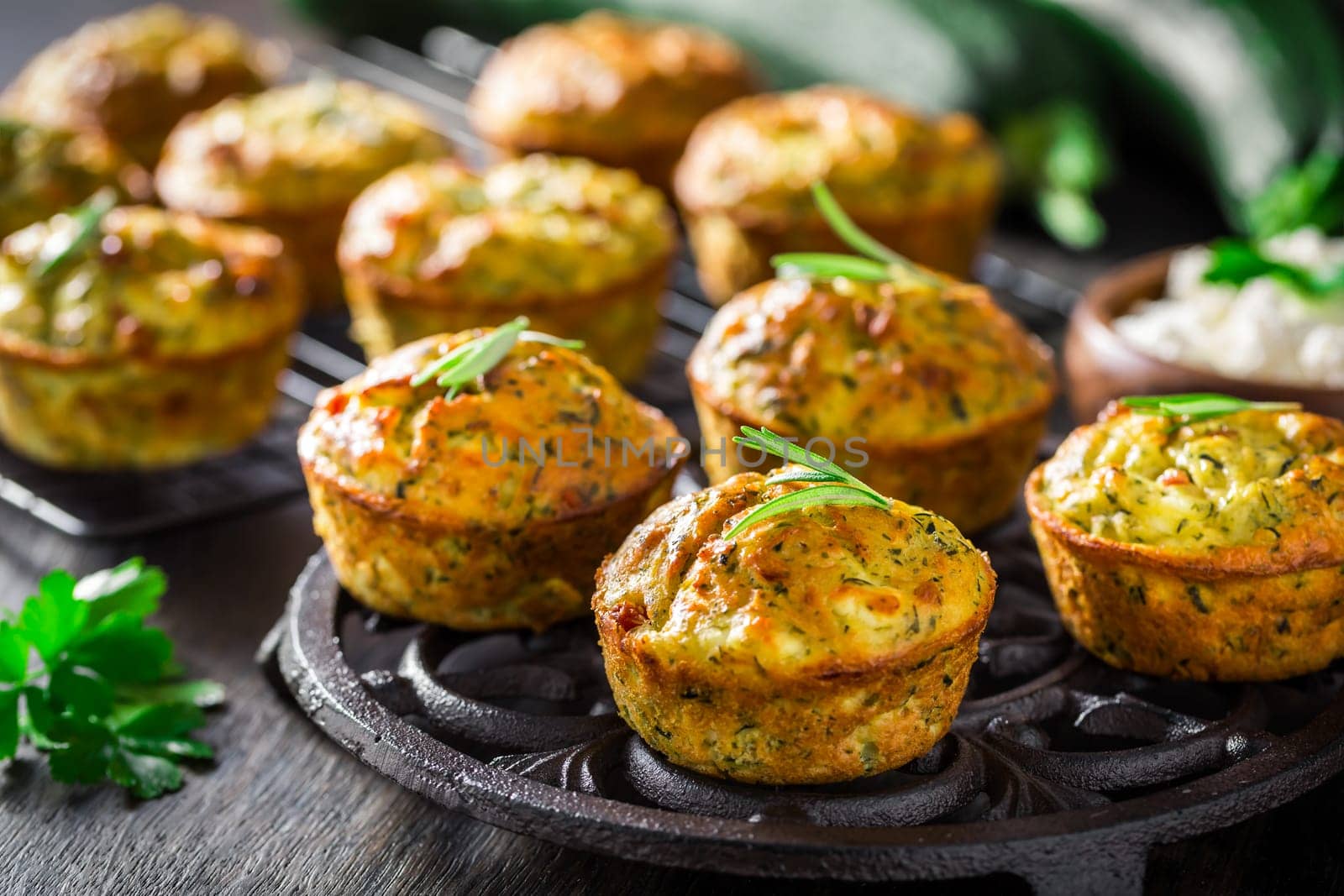Homemade zucchini muffins with feta cheese, savory courgette with ingredients