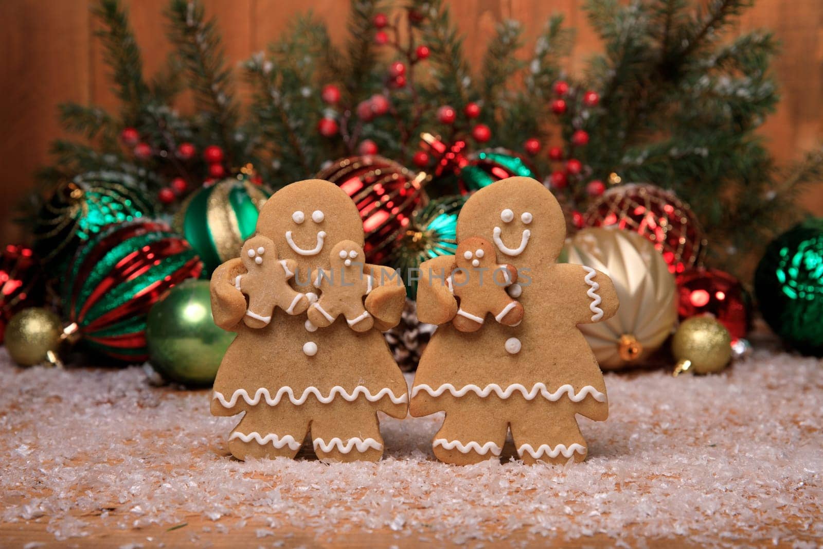 Gingerbread Family of 3 kids on Holiday Christmas Background