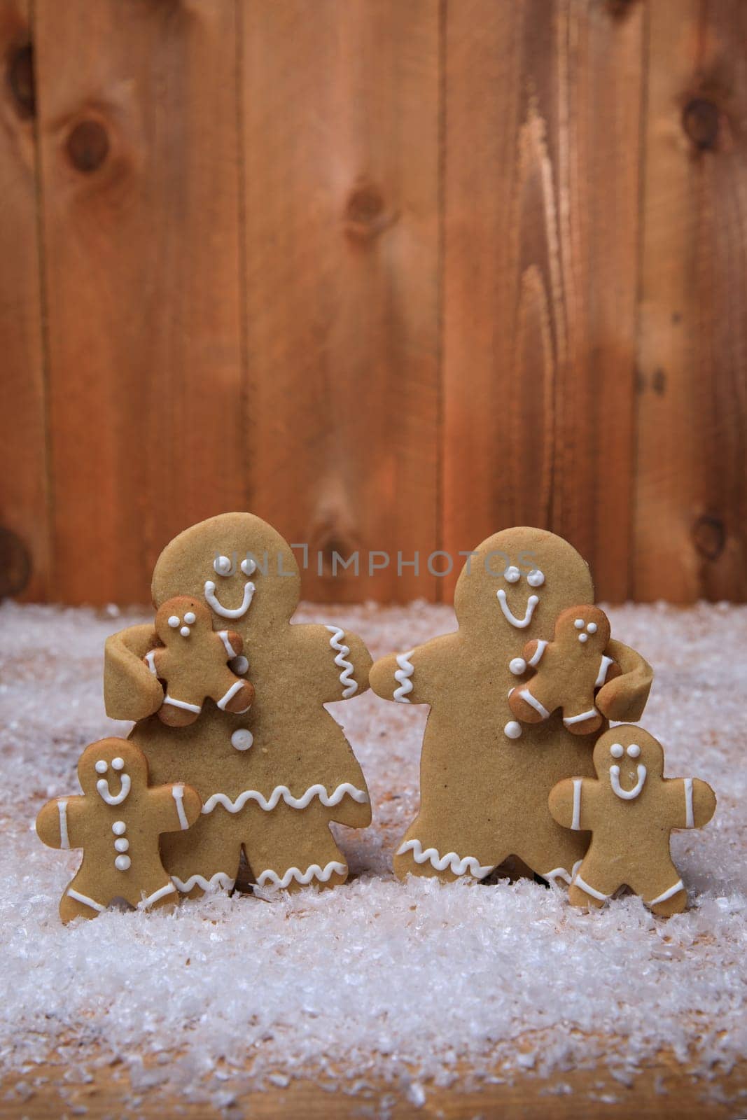 Gingerbread Family of 4 kids on Holiday Christmas Background