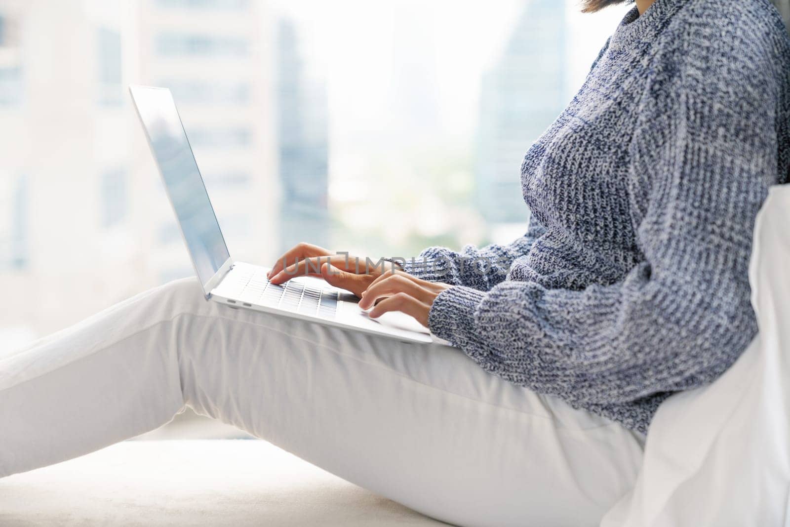 Woman using laptop computer, New lifestyle of people using laptop computers to work from anywhere