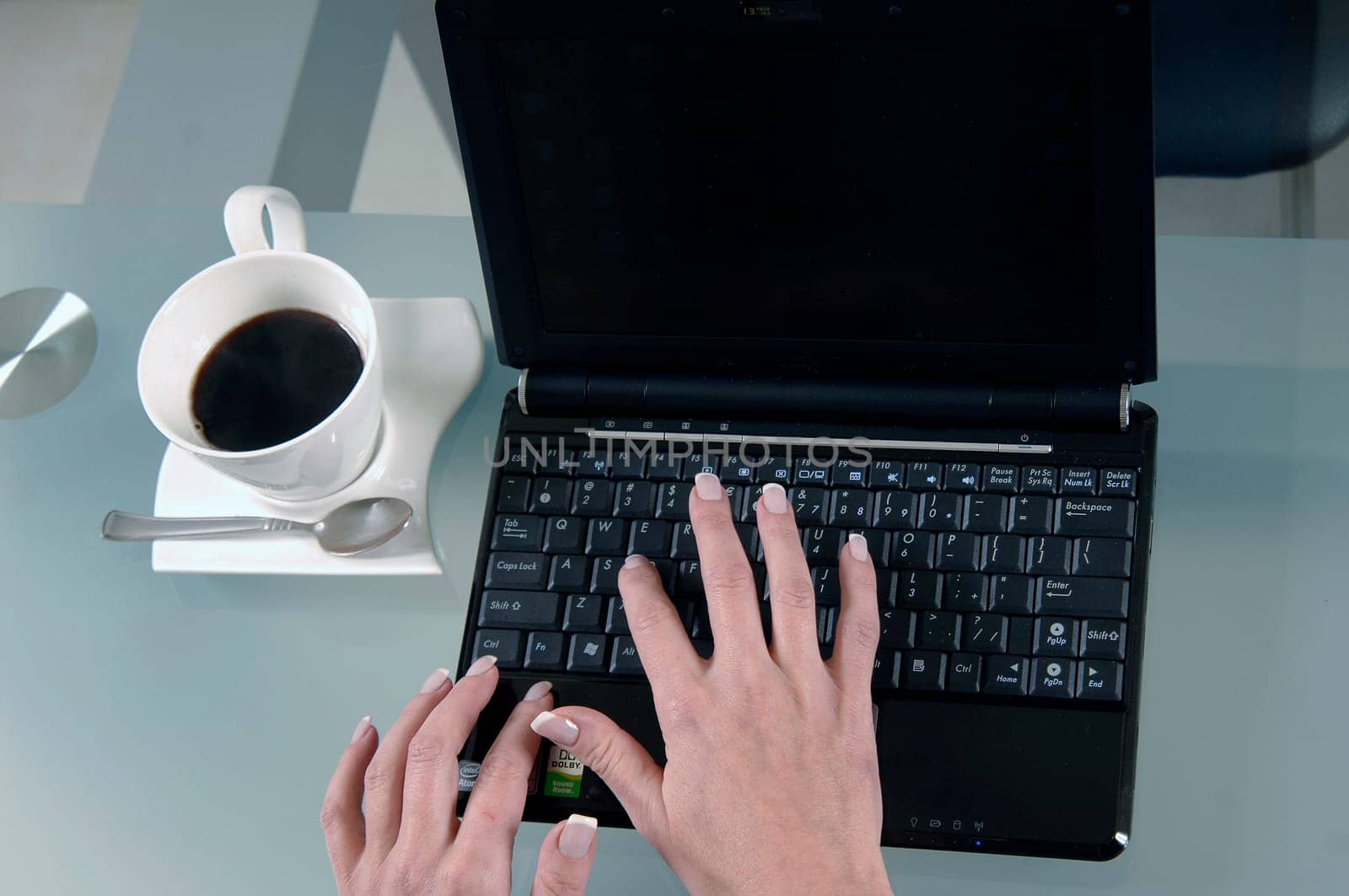 the woman is typing on the computer