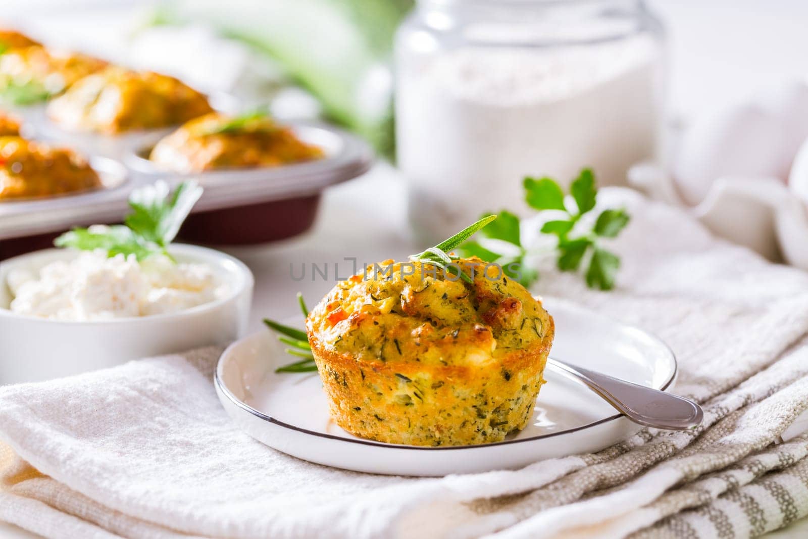 Homemade zucchini muffins with feta cheese, savory courgette with ingredients