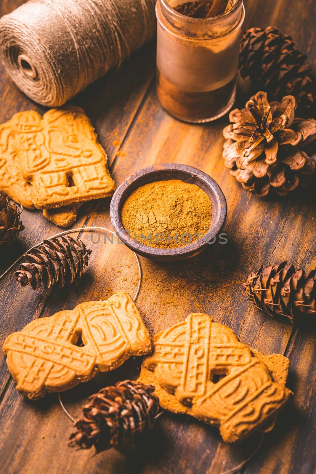 Gingerbread spice mix and seasoning for gingerbread cookies for Christmas on wooden background