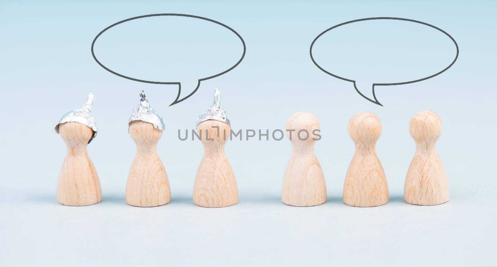 Group with alu hats talking to the other people, conspiracy theories, tin foil, conversation, communication, speech bubble
