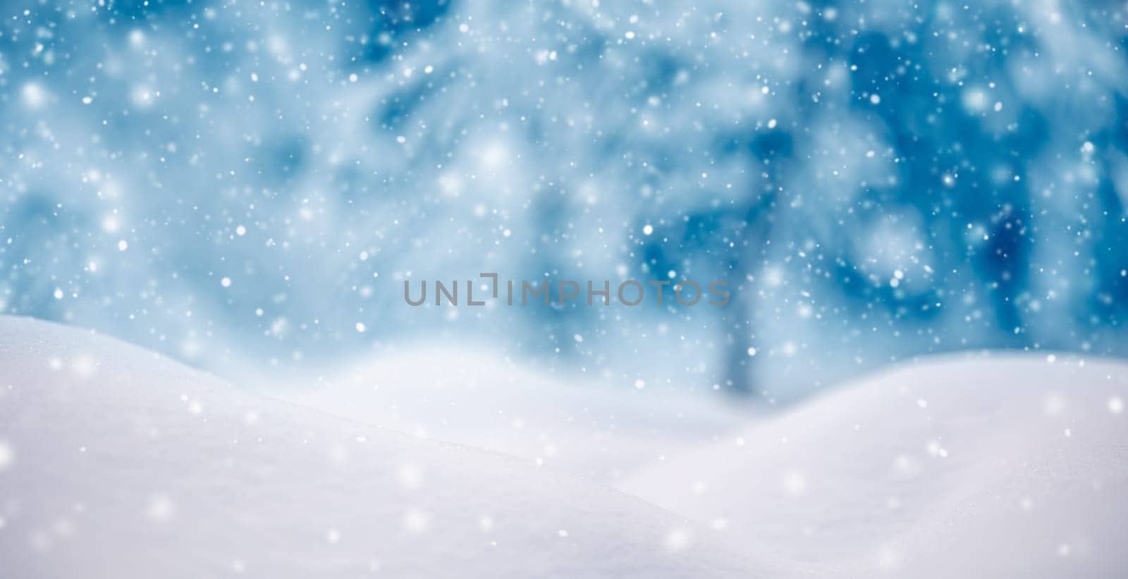 Snowy background with closeup view of the wavy snowdrifts in snowfall. Concept of the wallpaper, background and backdrop.