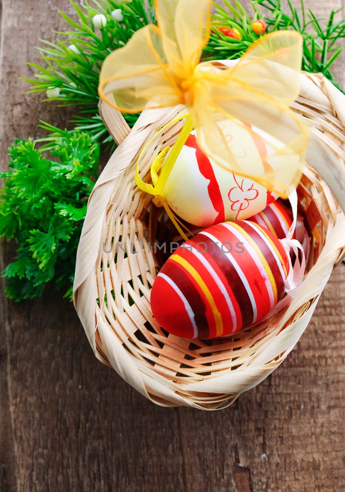 Colorful Easter eggs in basket