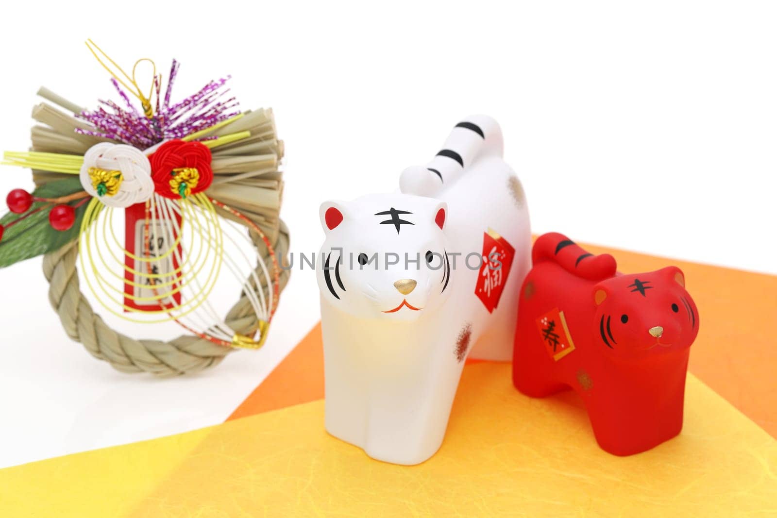 Dolls of Tora Tiger. Japanese new year card. Japanese new year tiger object. Japanese word of this photography means "fortune"""
