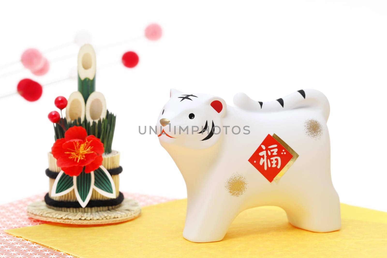 Dolls of Tora Tiger. Japanese new year card. Japanese new year tiger object. Japanese word of this photography means "fortune"""