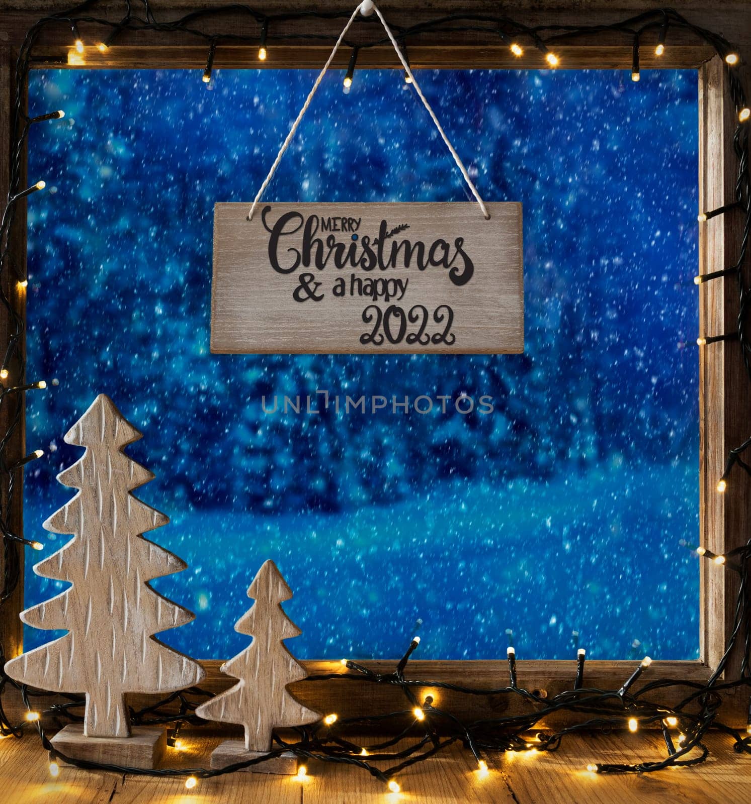 Window With Sign With Egnlish Calligraphy Merry Christmas And A Happy 2022. View Till Snowy Forest, Christmas Decoration Like Tree