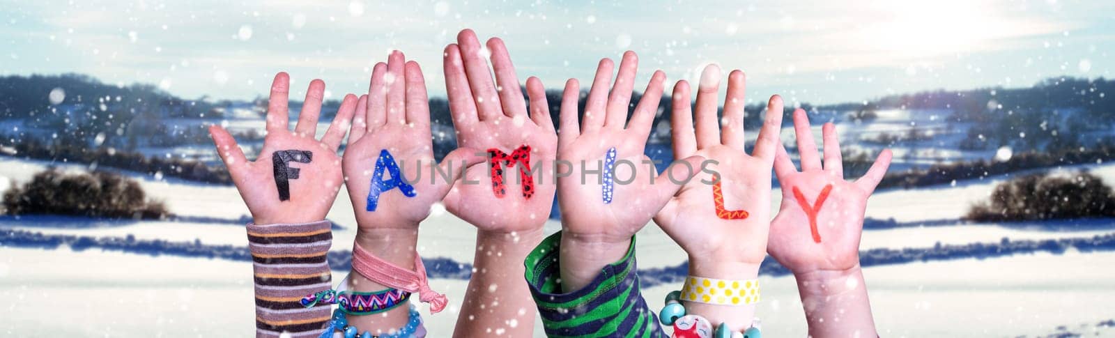 Children Hands Building Colorful English Word Family. Snowy Winter Background With Snowflakes