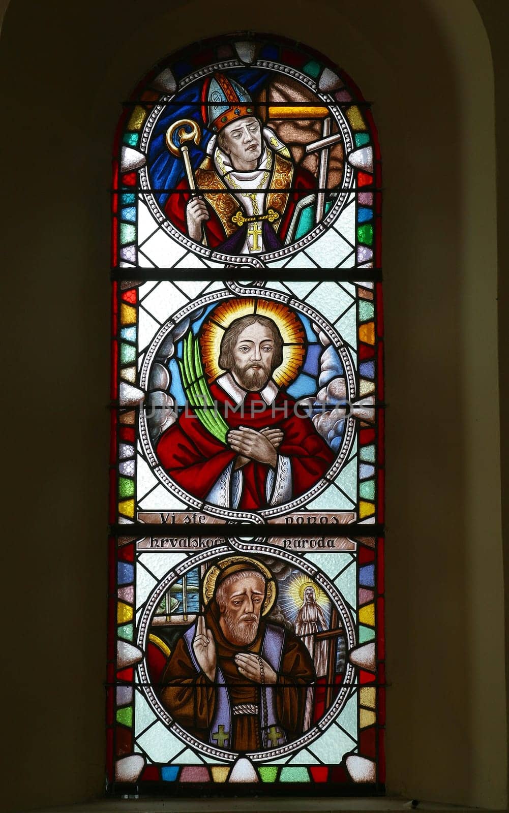 Blessed Agostino Casotti, Saint Marko Krizin and Saint Leopold Mandic, stained glass window in the church of Exaltation of the Holy Cross in Kravarsko, Croatia