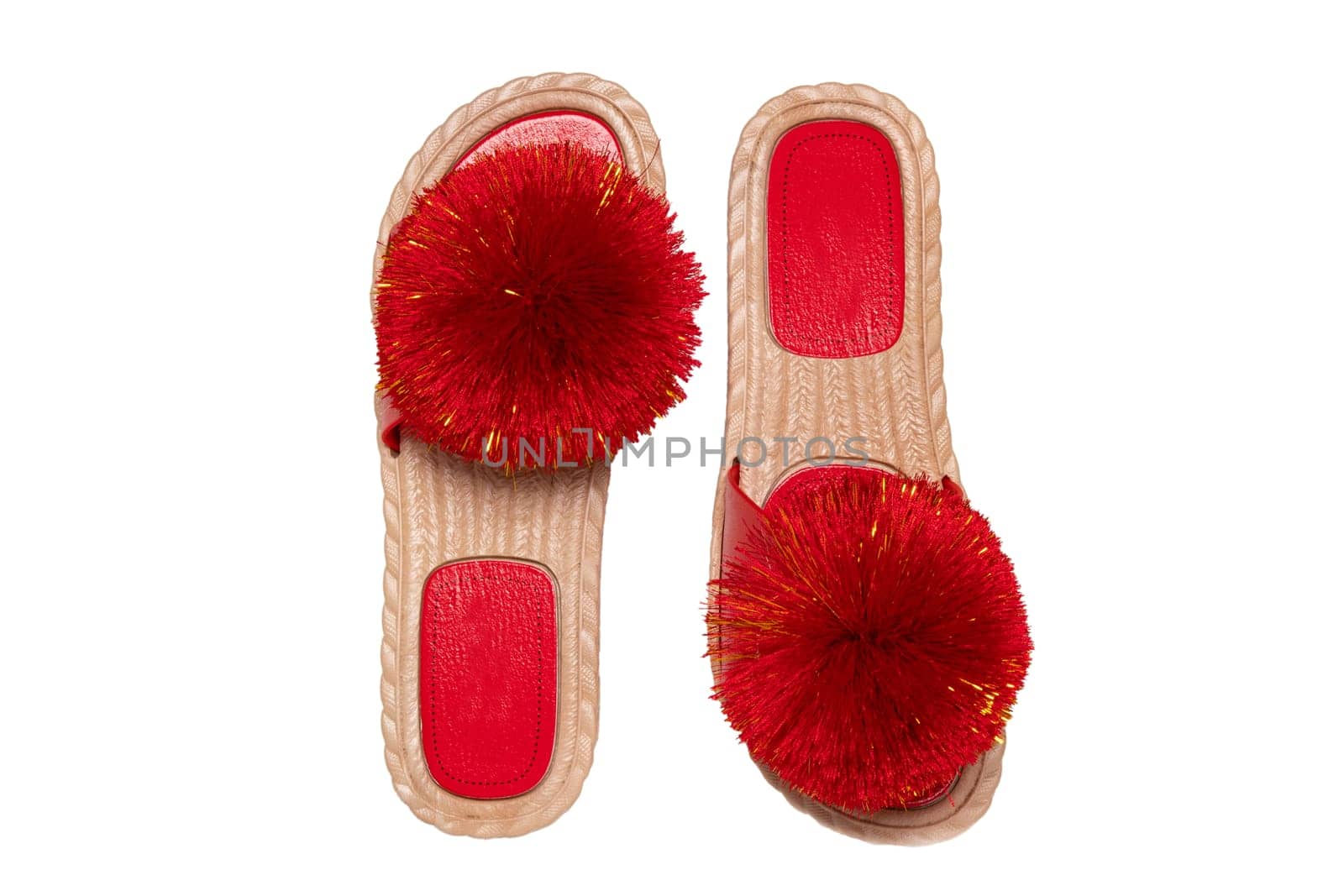 Womens boots and shoes. Top view of a pair women slipper with red pompoms isolated on a white background. Fashion of sandals.