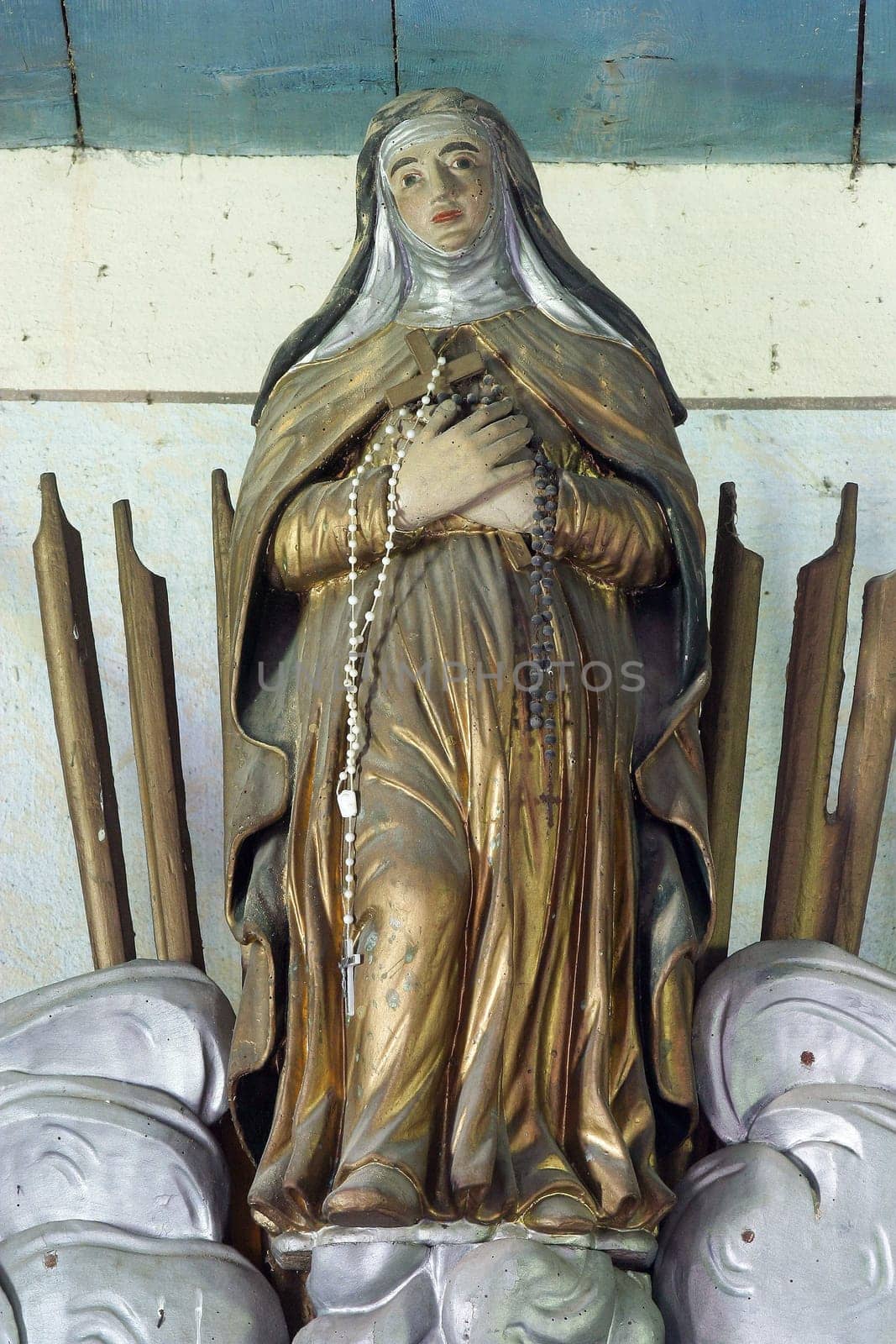 Statue of saint on the altar of St. John of Nepomuk in the church of Our Lady of the Snows in Volavje, Croatia