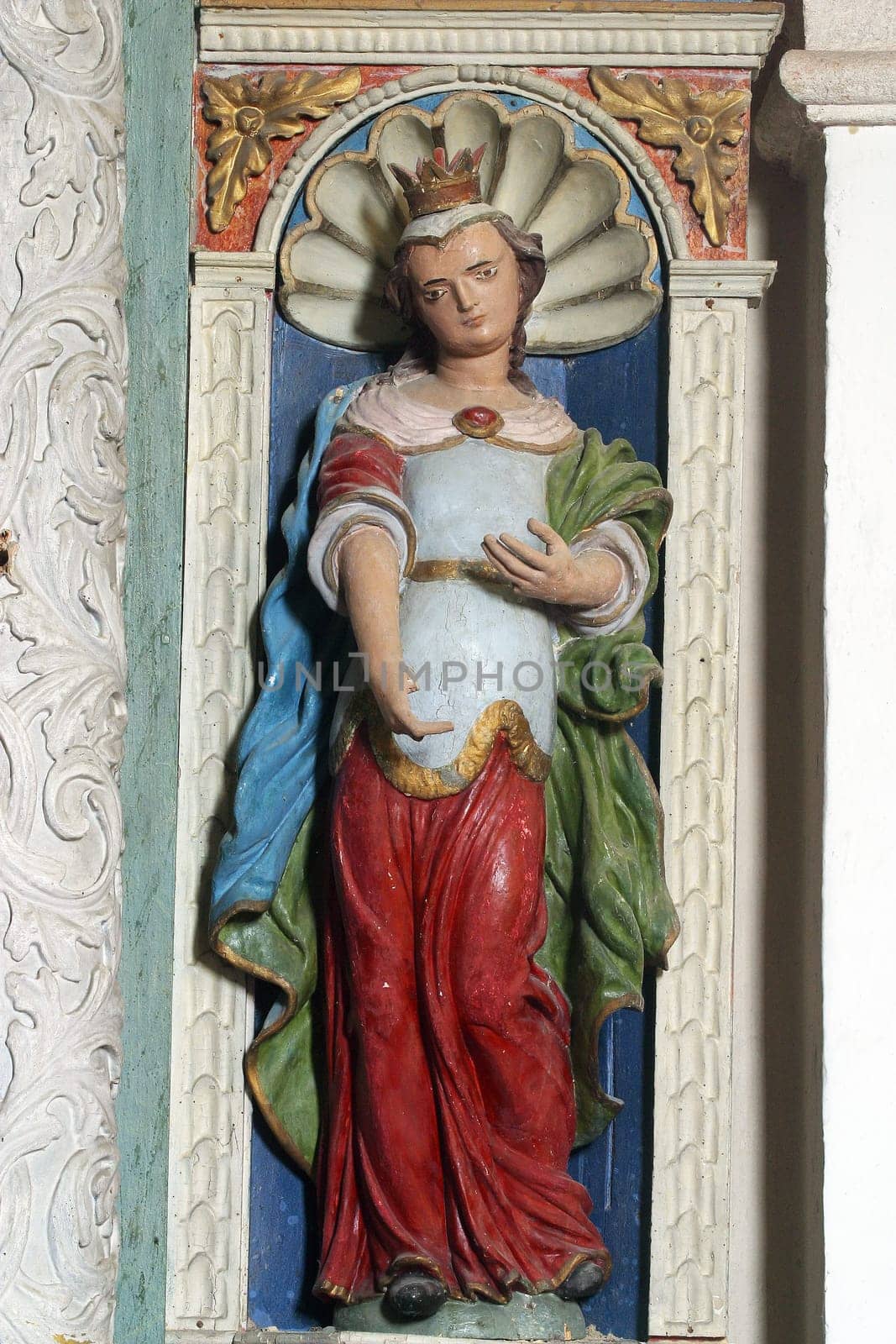 Saint Lucia, statue on the altar of St. Mary in the church of Our Lady of the Snows in Volavje, Croatia