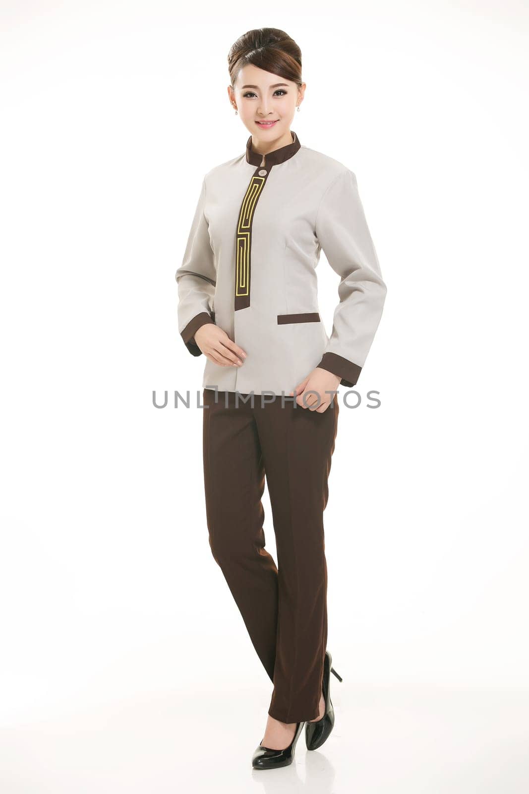 In a variety of occupation clothing cleaners stand in front of a white background