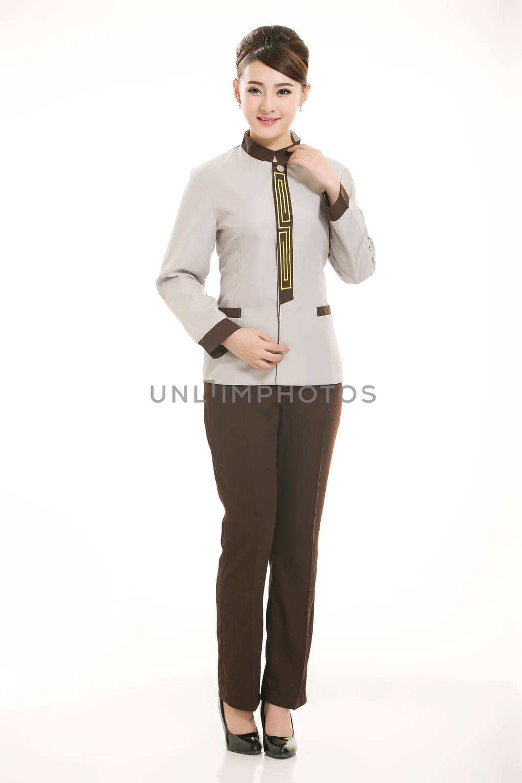 In a variety of occupation clothing cleaners stand in front of a white background