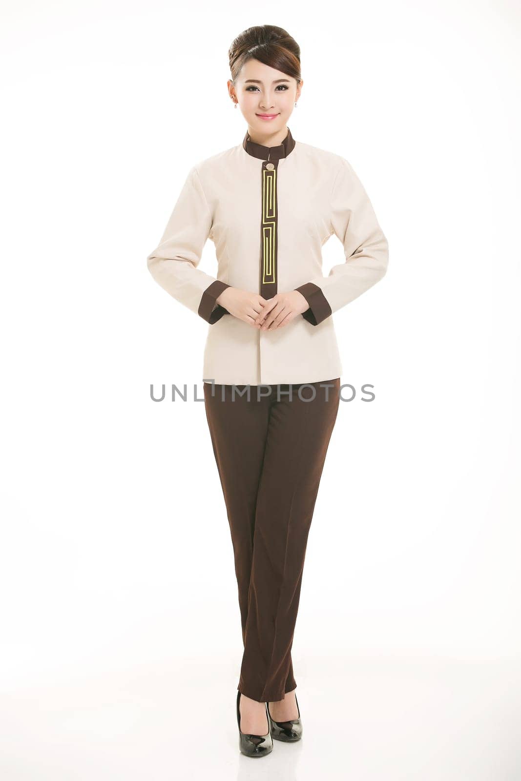 In a variety of occupation clothing cleaners stand in front of a white background