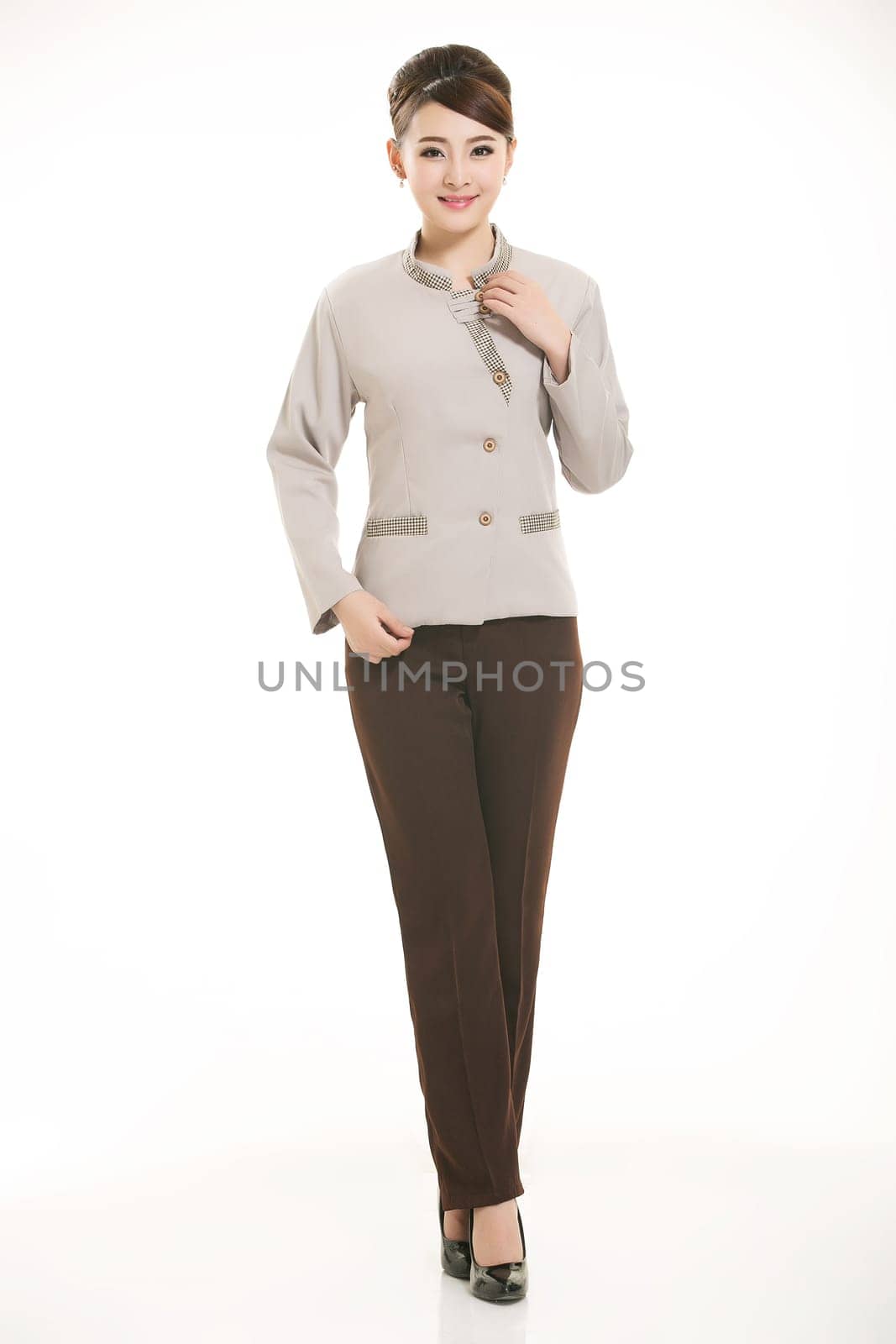 In a variety of occupation clothing cleaners stand in front of a white background