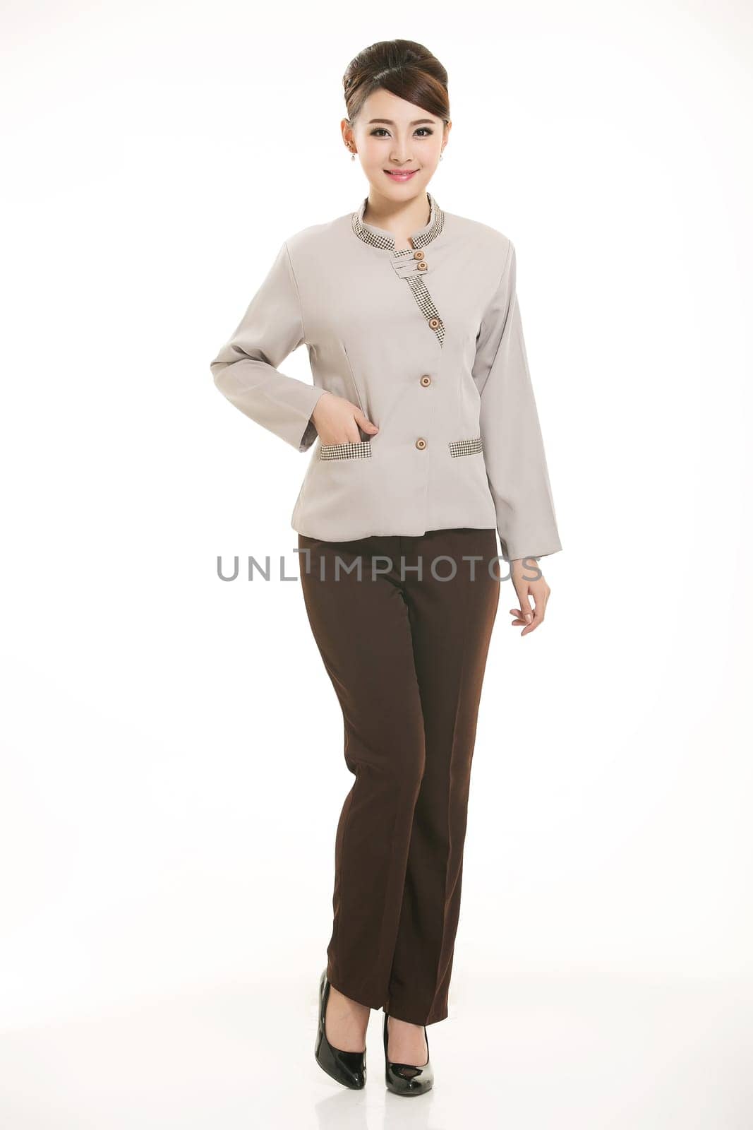 In a variety of occupation clothing cleaners stand in front of a white background