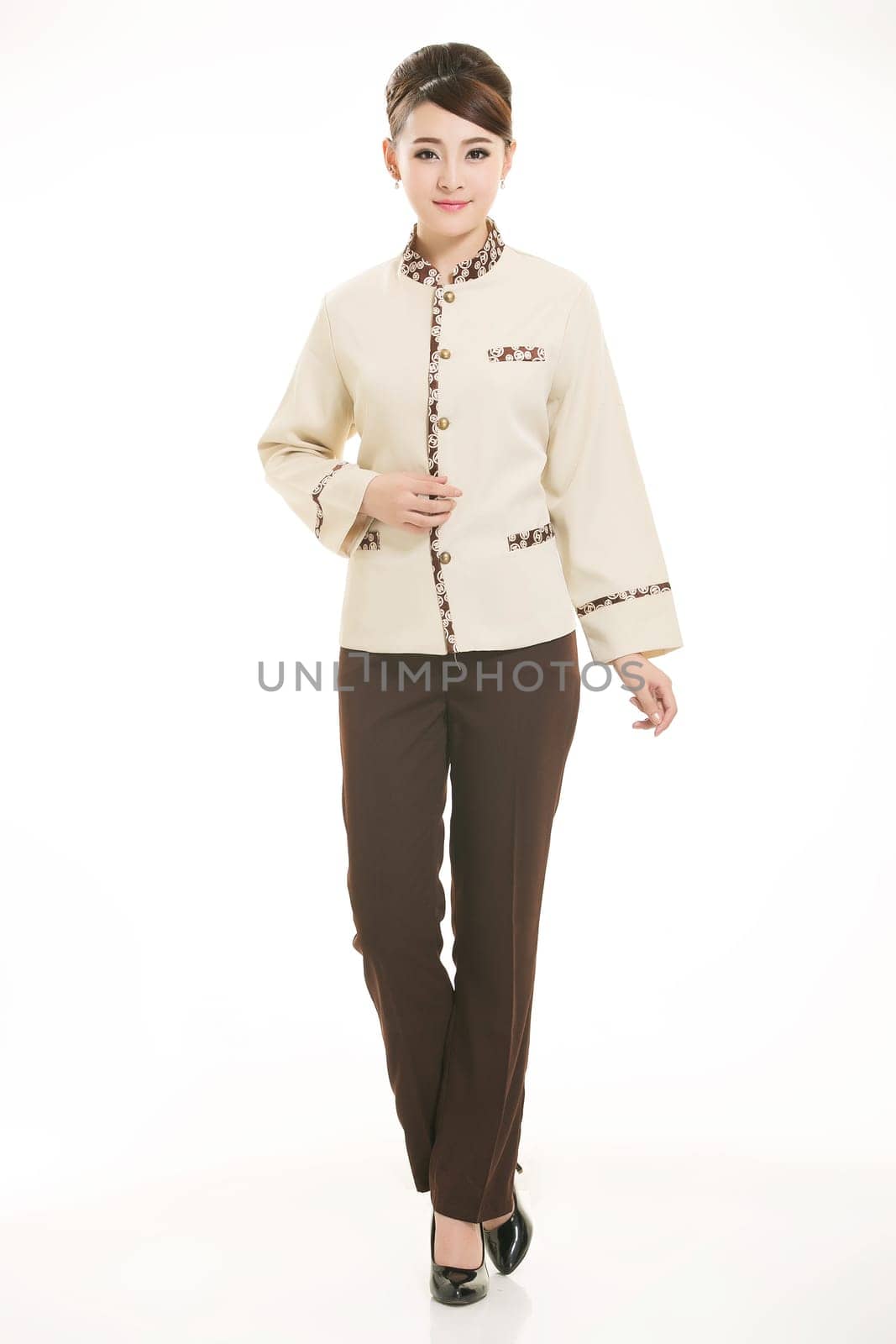 In a variety of occupation clothing cleaners stand in front of a white background